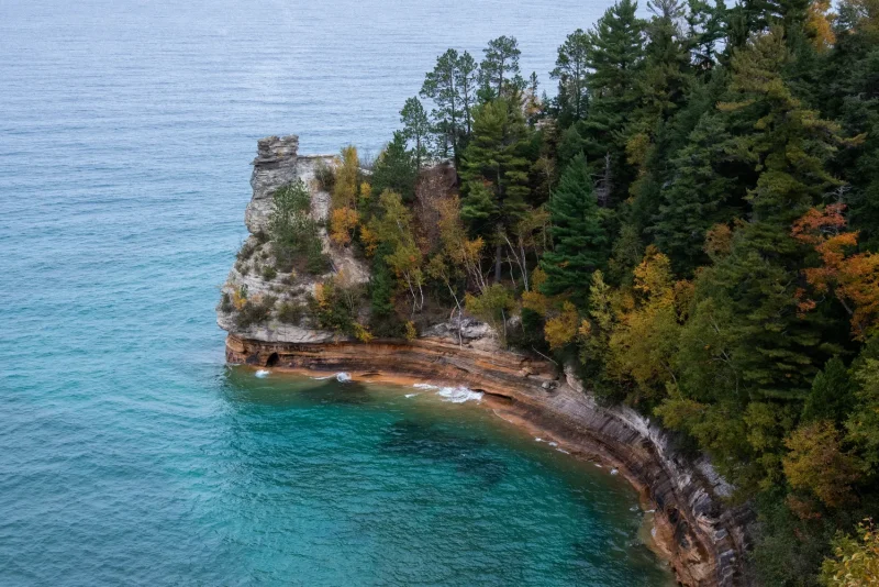 Autumn view of Pictured Rocks cliffs and turquoise water near Munising, Michigan