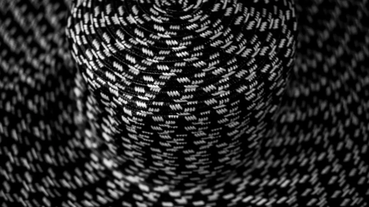 Close-up of a black and white woven paracord sheath
